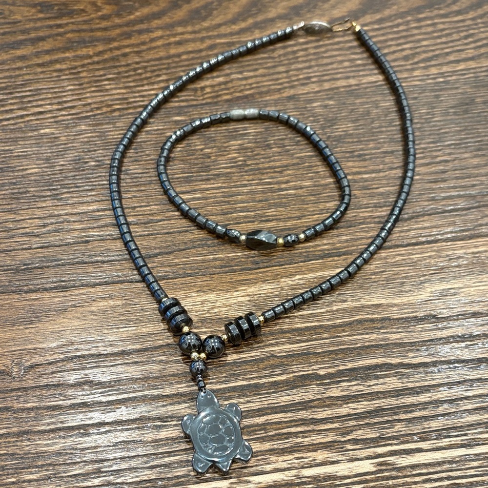 Elegant Hematite and Gold Turtle Pendant Necklace with matching bracelet - Picture 4 of 6